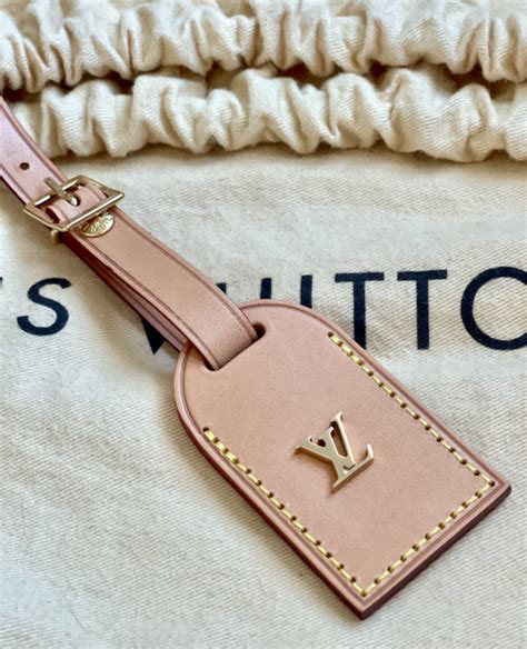 louis vuitton purse tag.